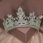 Full view of a silver bridal tiara crown with Swarovski and CZ crystals in marquise, pear, and round shapes, displayed on an Elnoria box.