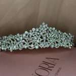 Close-up of a silver crystal lace tiara with Swarovski and cubic zirconia stones