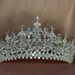 Crystal Cathedral Crown luxury bridal tiara with clear cubic zirconia in marquise, pear, and round cuts, detailed front view.