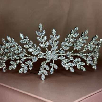 Sparkly botanical bridal headpiece featuring marquise and round cubic zirconia stones in leaf clusters.
