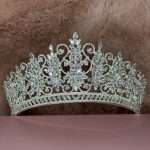 Crystal Snowflake Tiara featuring Swarovski crystals and cubic zirconia in marquise and round shapes, with snowflake clusters and sparkling filigree scrollwork