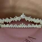 Crystal Whisper Tiara with marquise and round cubic zirconia stones, silver bridal crown photographed on a pink Elnoria box.