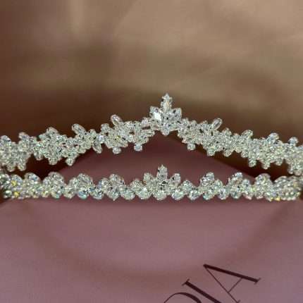Crystal Whisper Tiara with marquise and round cubic zirconia stones, silver bridal crown photographed on a pink Elnoria box.