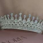 Front close-up of Teardrop Royale Tiara with pear teardrop Swarovski & CZ stones, marquise and round crystal details, and a baguette crystal band.