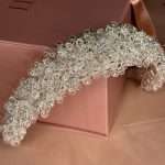 Silver crystal bridal headband with clear crystals and cubic zirconia flowers, handmade by Elnoria