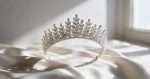 Swarovski crystal bridal tiara with marquise stones standing on ivory silk in daylight